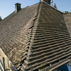 Removing old roof tiles